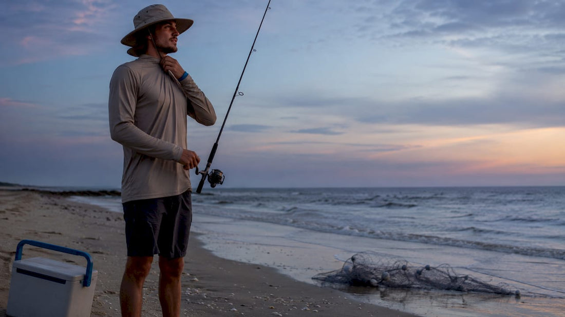 Angler in performance fishing apparel by river