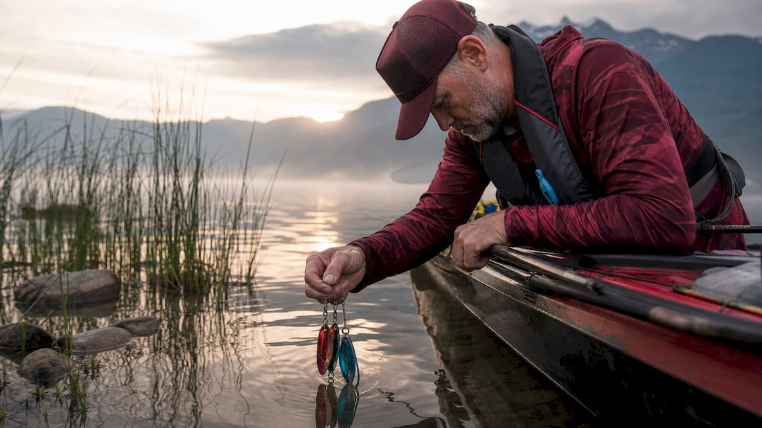 Angler attaching fishing flashers on boat