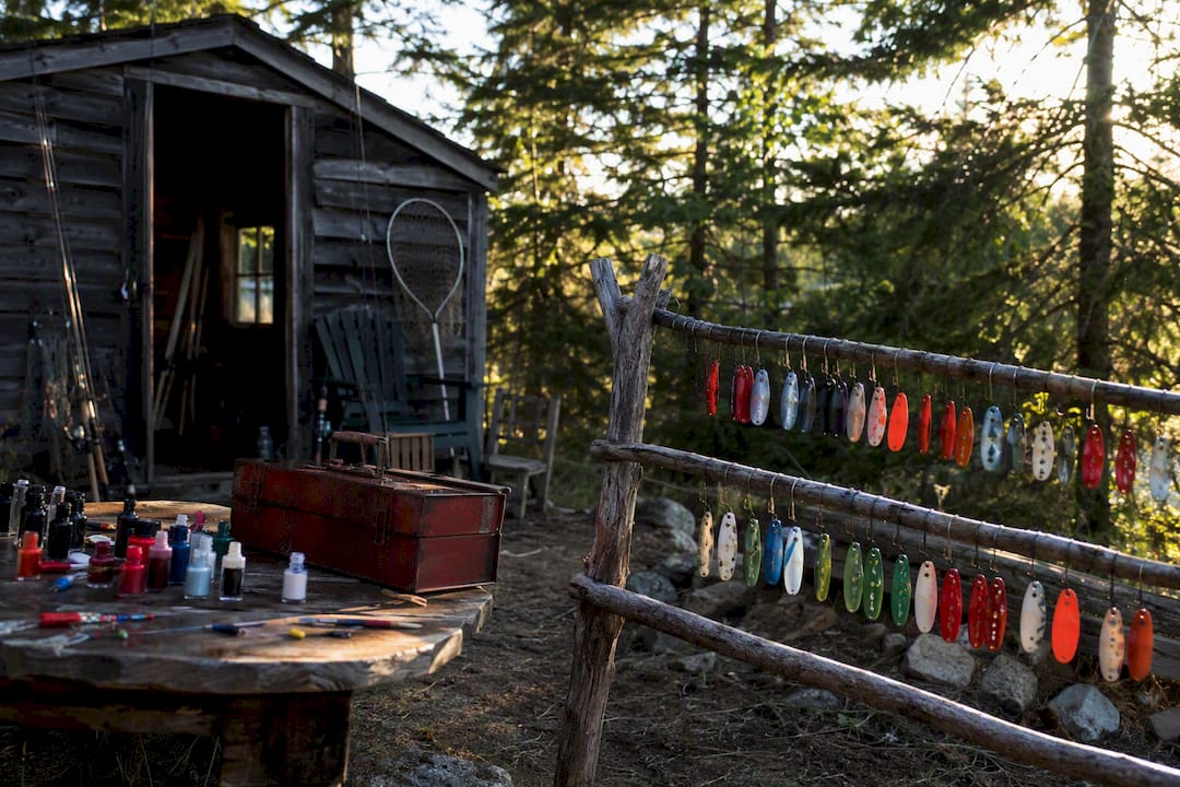 Spinner blades drying on outdoor workbench