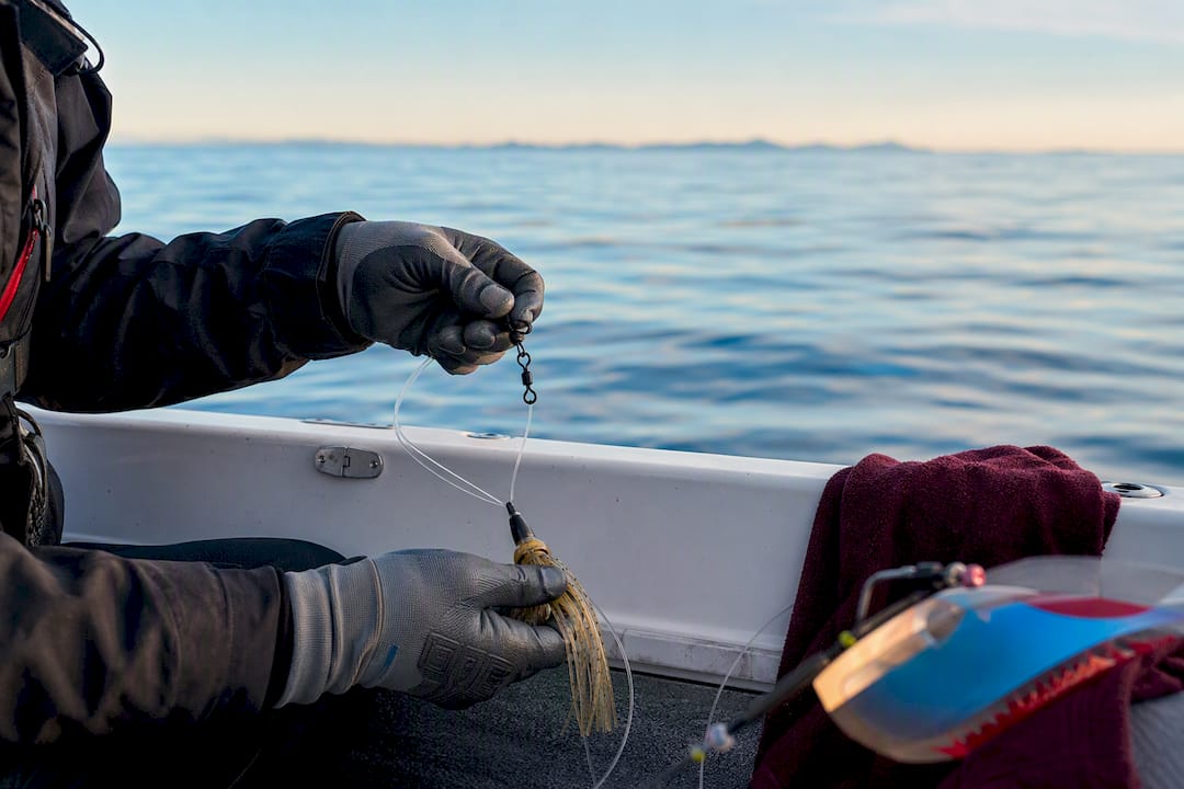Angler swapping a salmon trolling leader