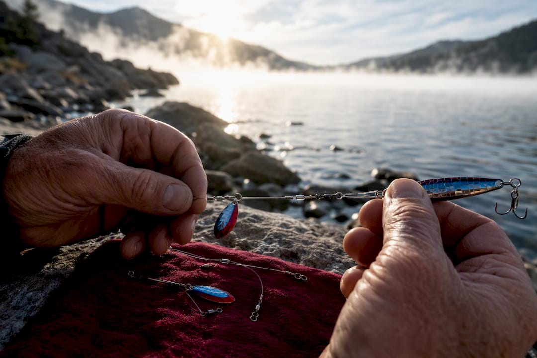 Angler comparing kokanee lure styles